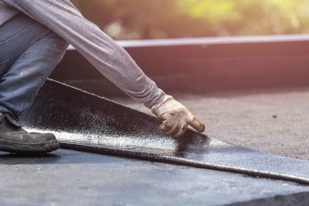 Professional Basement Waterproofing technician working in Millington, NJ